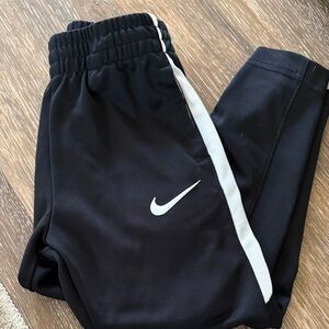 Nike Kids Black Joggers with White Stripe